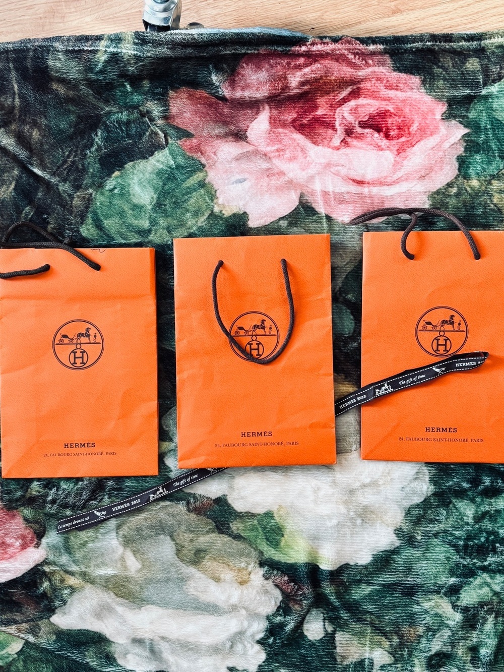 3 Hermes Orange Shopping bags size 8x3x6" and 34" of Hermes Holiday 2012 ribbon